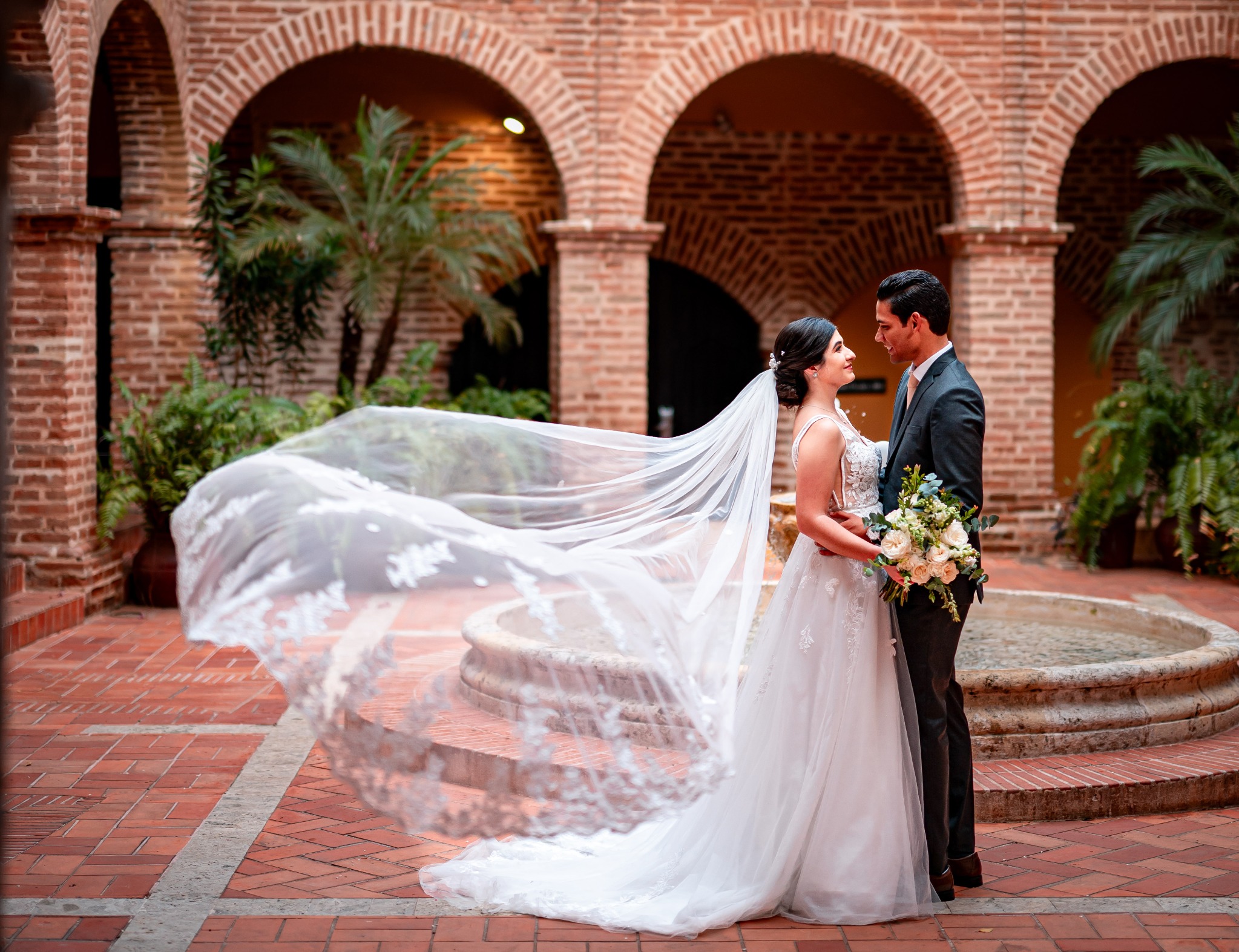 Newlyweds in a historic Dominican courtyard